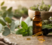 Amber bottle of herbal pain relief oil with herbs